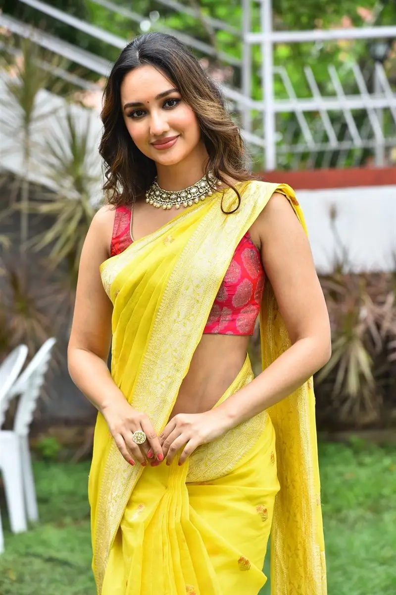 Akanksha Sharma Yellow Saree Red Sleeveless Blouse